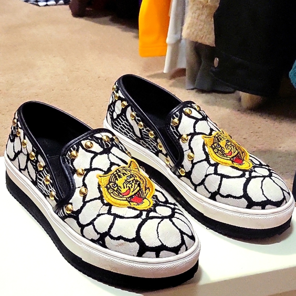 Steve Madden Slip Ons look like Ed Hardy